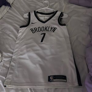 Very cute jersey only worn once to a game small stain on the back